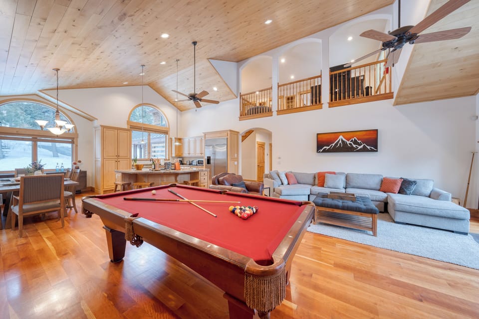 The living area features a large sofa.