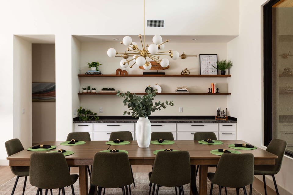 Share stories and meals in this inviting desert-inspired dining space.