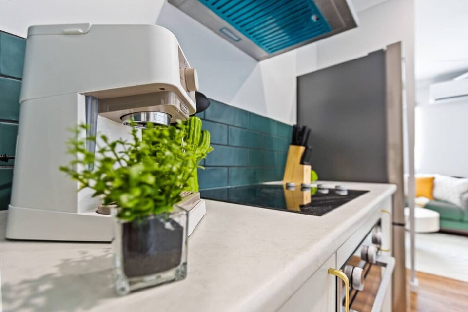 The kitchen also features a high-quality coffee machine, perfect for brewing your favorite espresso or cappuccino. Whether you're starting your day or enjoying a cozy afternoon, it's ready to deliver a delicious coffee experience.