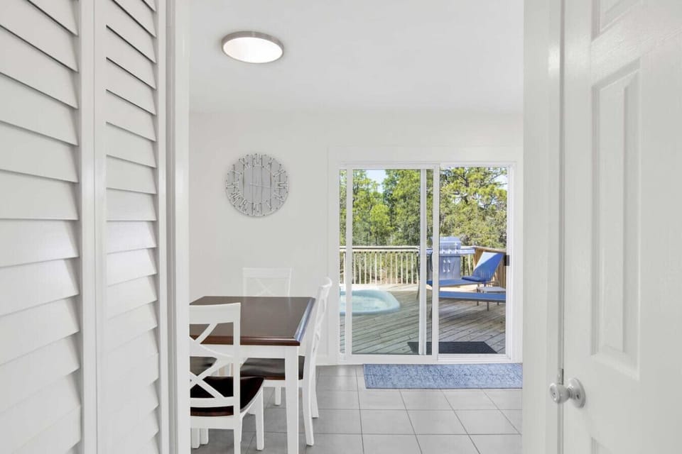 Keep an eye on the pool from your seat at the dining table.