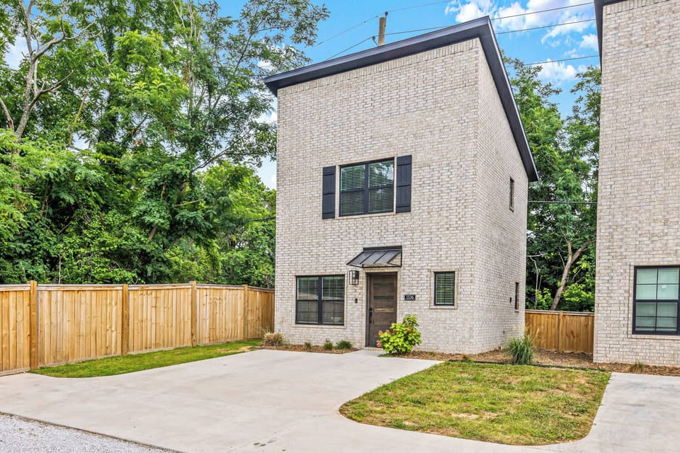 Welcome to your Fayetteville retreat—modern two-story condo with private entry and dedicated parking.
