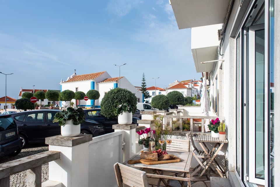 Santa Marta outdoor dining space with a view of local architecture.