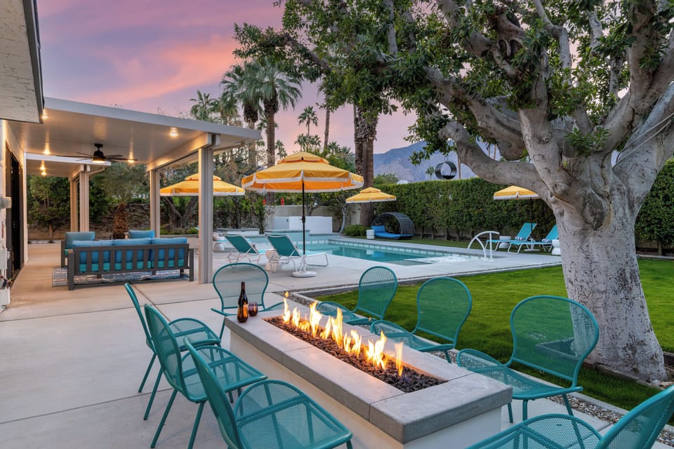 Gossip around the gorgeous outdoor fire feature