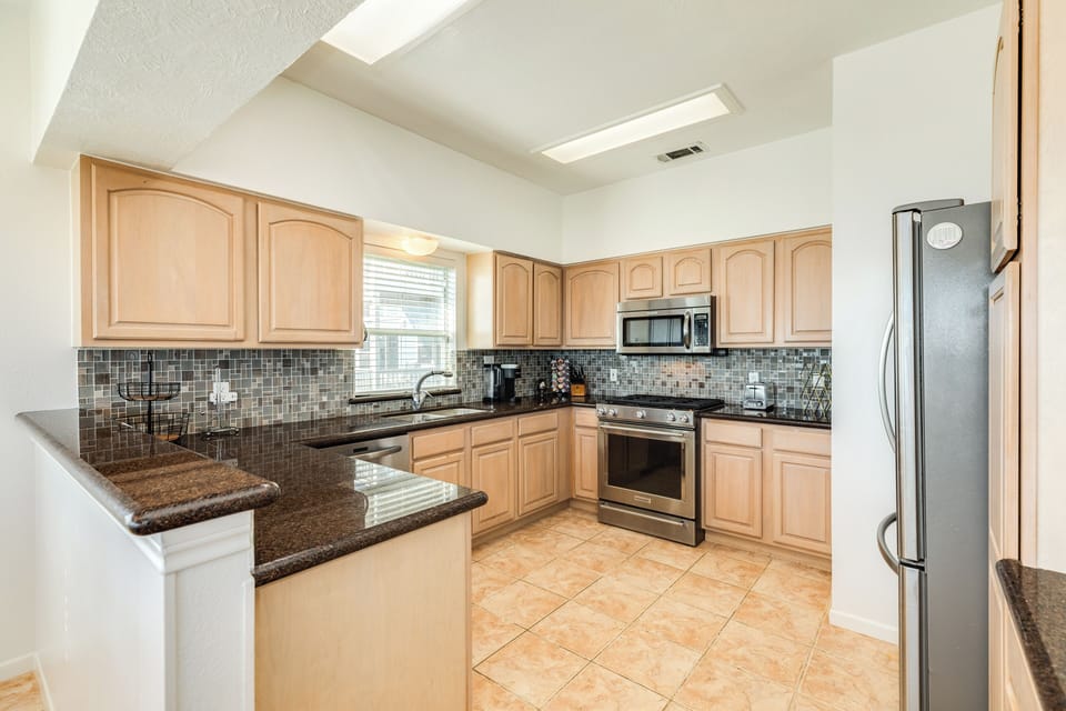 Fully equipped kitchen with stainless steel appliances