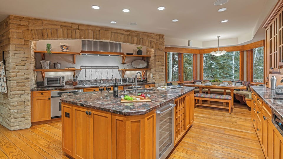 Large gourmet kitchen with breakfast nook