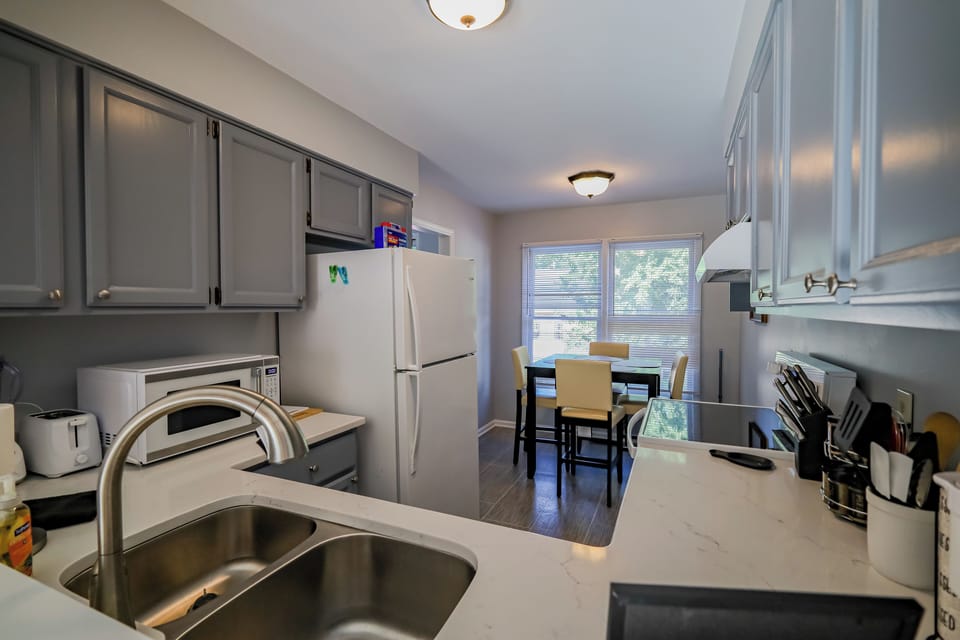Pass through to the kitchen from the living room.