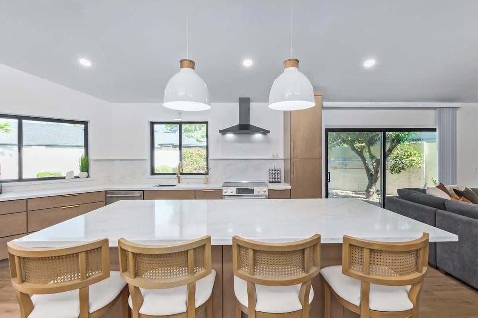 Panoramic view of kitchen with dinning area.