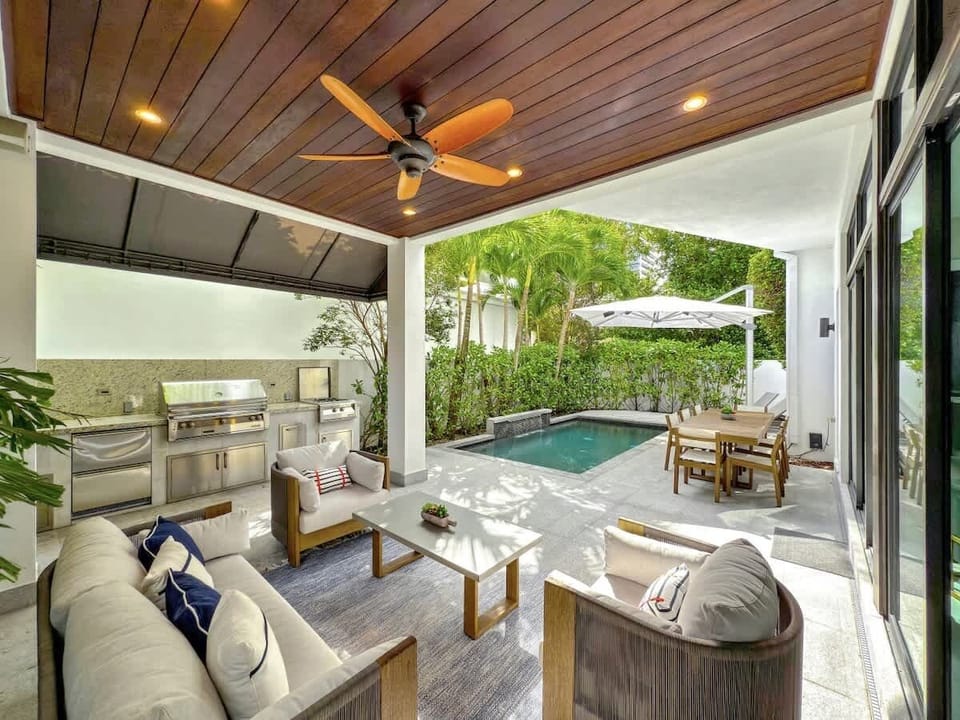Unwind on the patio, featuring a covered sitting area for enjoying the outdoors in comfort.