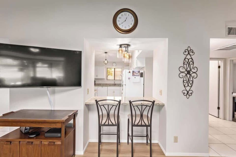 Gather around the dining table for meals and memories in this elegant and spacious dining area.