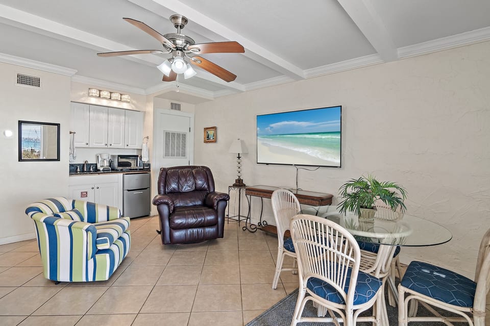 The 1st Floor features another Living Room w/ 50" Smart TV, Multi-Game Arcade Table, a Kitchenette, and Patio Access - Great for the Kids!
