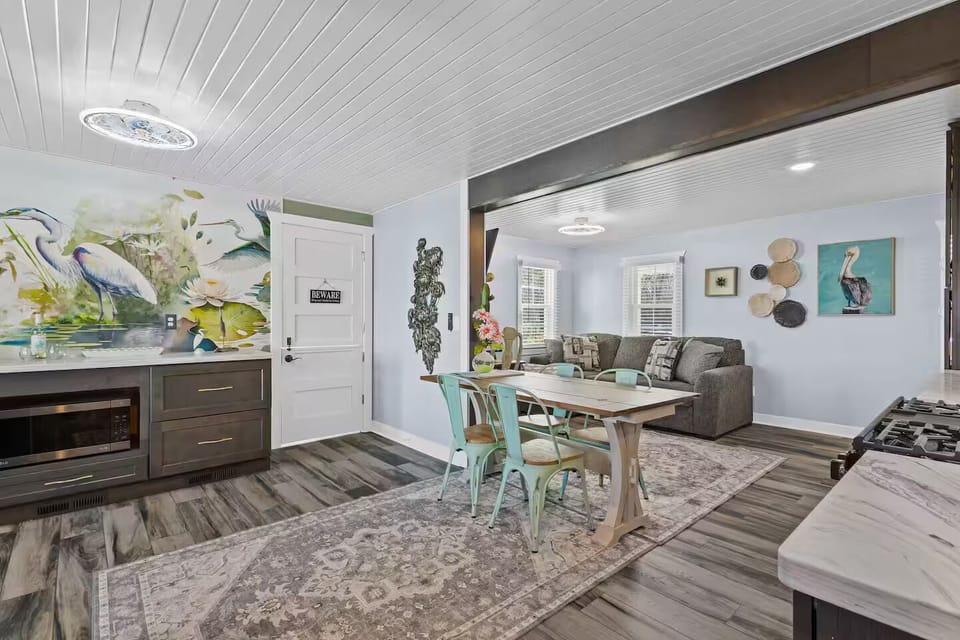 Door next to countertop leads to the “dog room”.