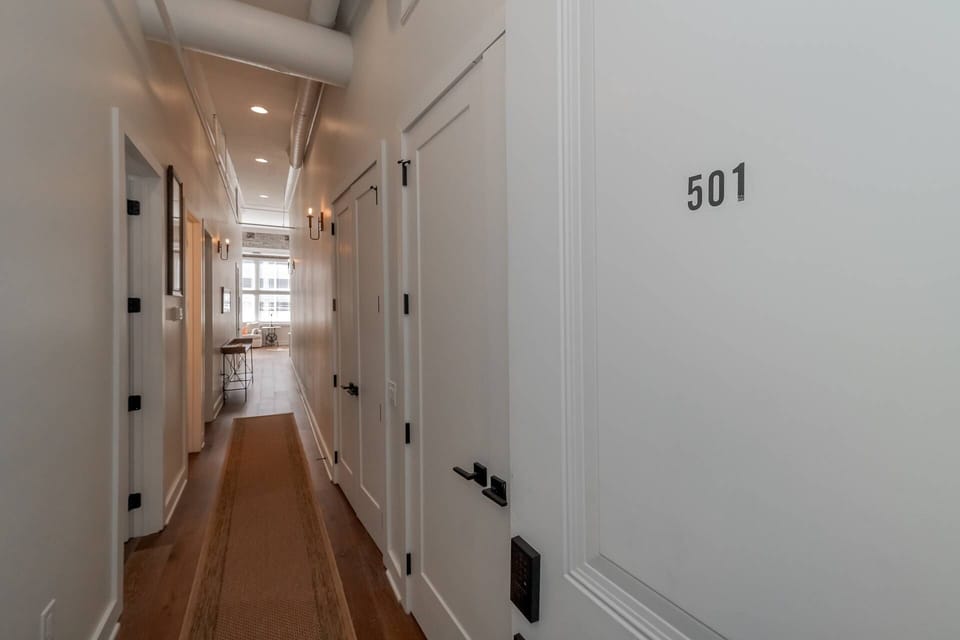 Welcome to #501! Bedrooms and bathrooms are located along the hallway. Open concept great room is located at the end.