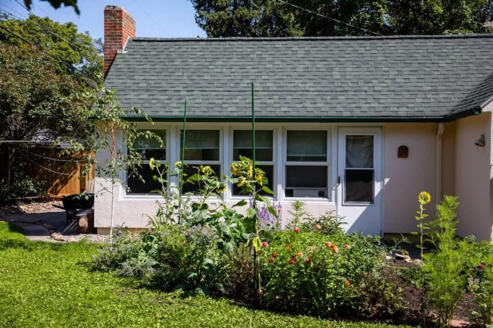 Take a moment to view the lovingly attended garden beds in the yard. 