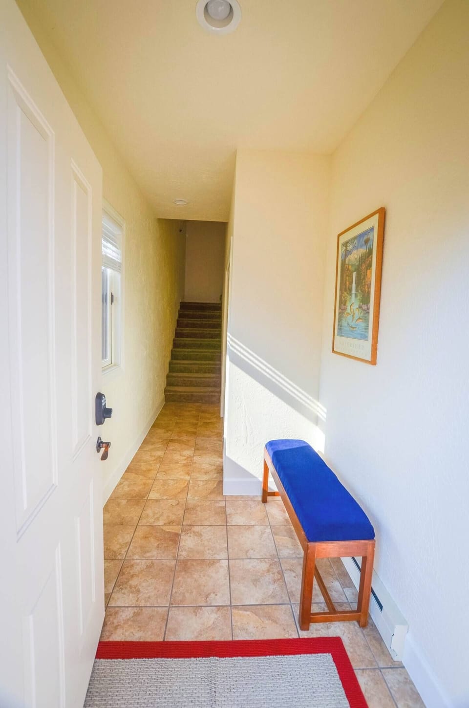 An interior stairway leads to the loft apartment.