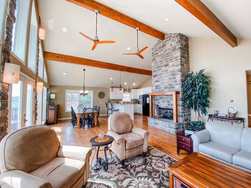 Gas fireplace, cathedral ceilings, and lake views! (Fireplace available in the winter)