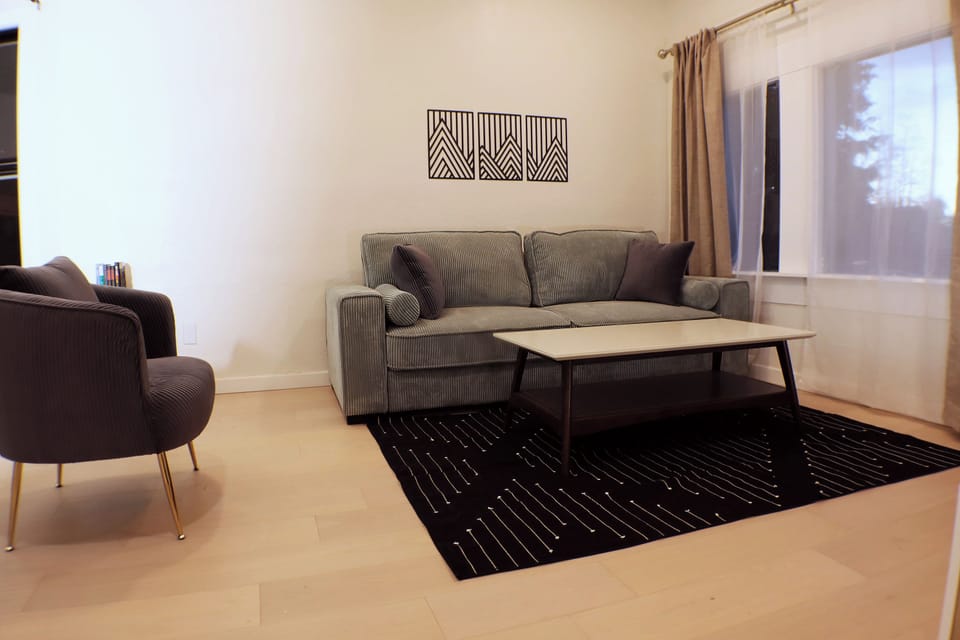 Cozy living room with modern furniture and a spacious layout for comfort and relaxation.