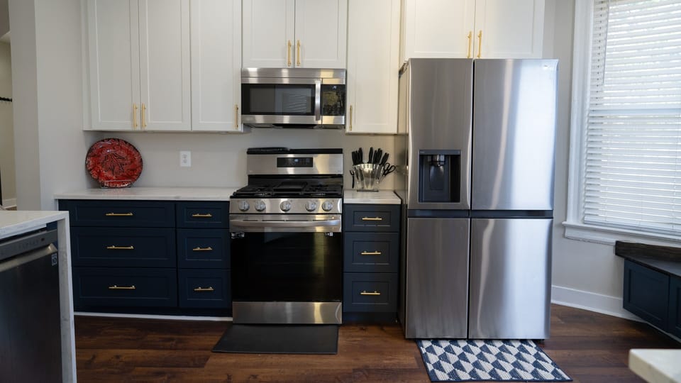 Kitchen, stove, refrigerator, counter, microwave, cabinets