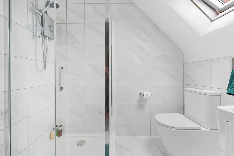 Main bathroom with shower and toilet