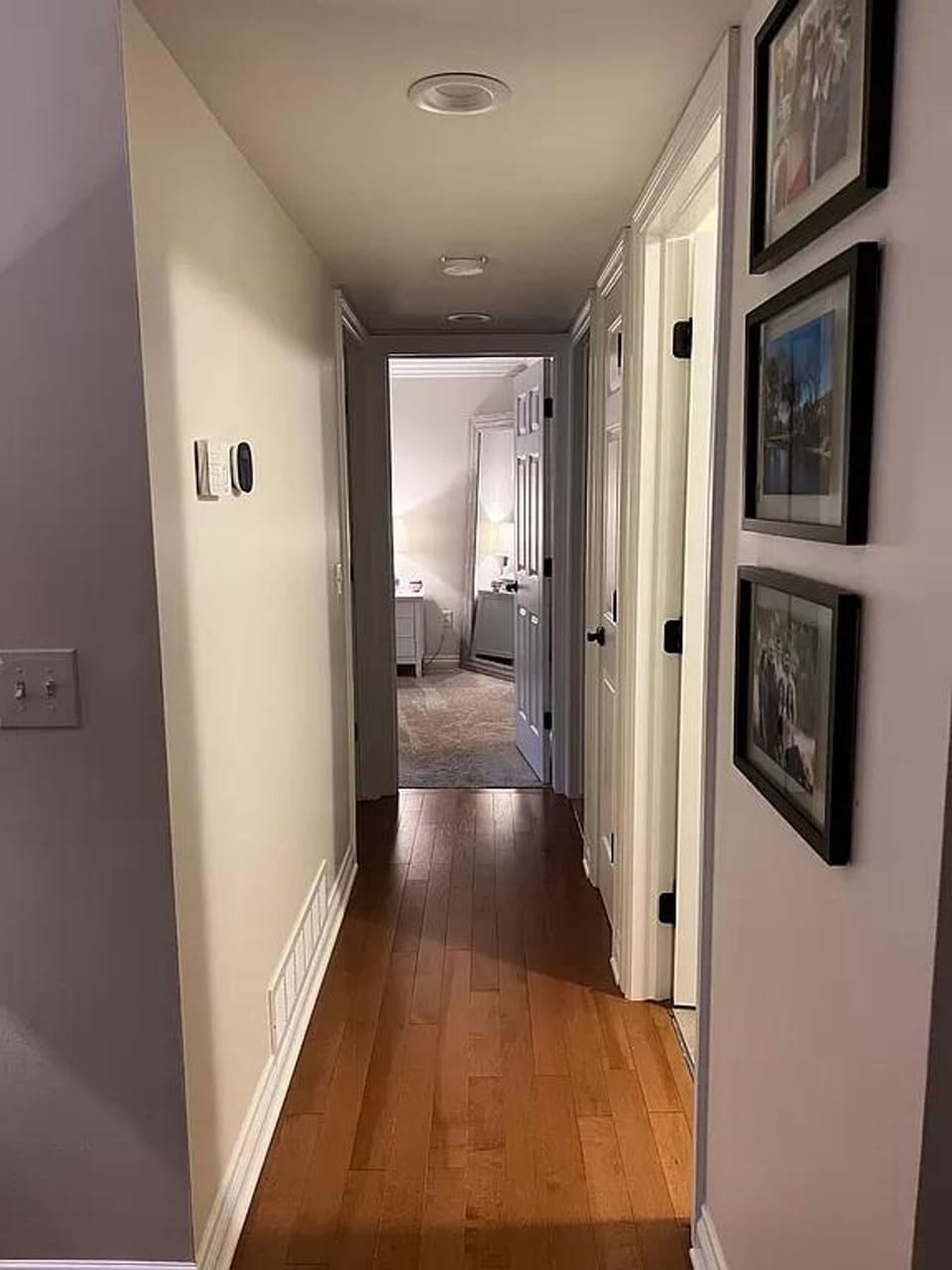 Hallway to bedrooms, bathroom, and laundry room.