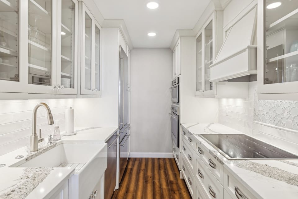 Fully stocked kitchen with stainless steel appliances