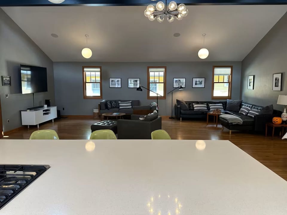 From the kitchen, the living room is fully visible and interactive.