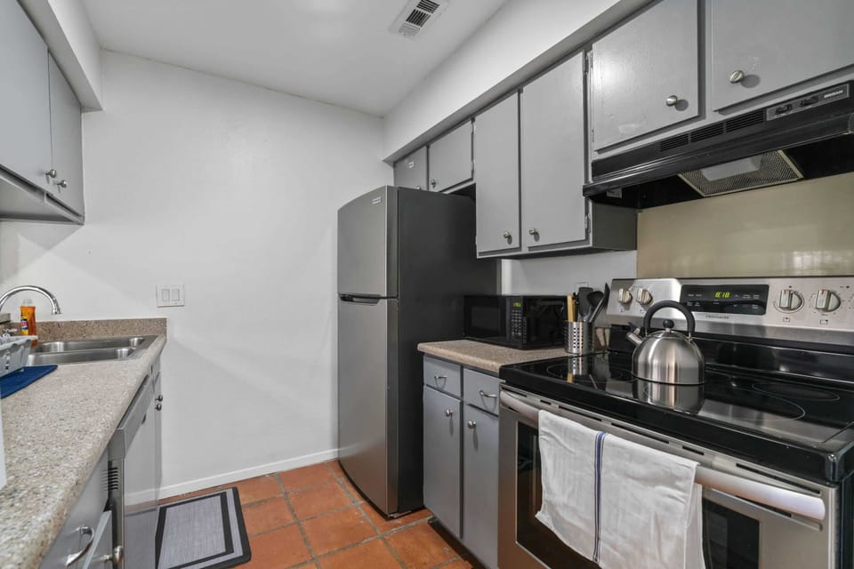 Fully stocked kitchen with all amenities for cooking at home or take out.