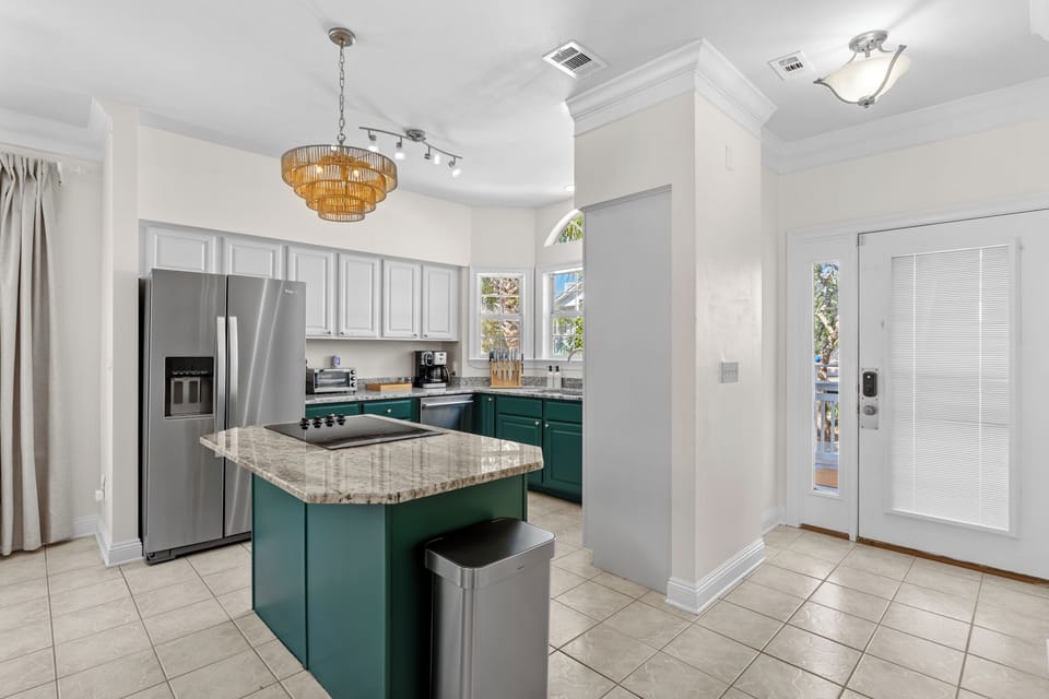 Fully equipped kitchen with modern appliances, ample counter space, and everything you need to prepare delicious meals.