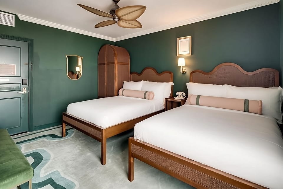 Unwind in bright twin beds with calming, designer details.