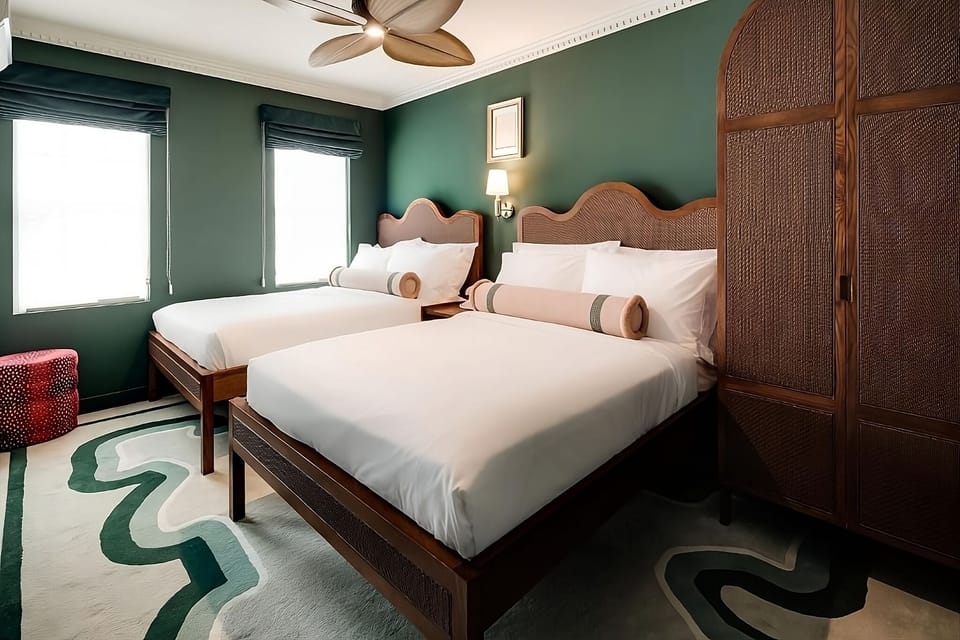 Wake up refreshed in airy beds beside sunlit windows.