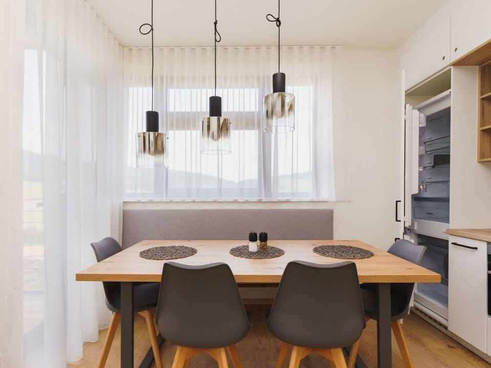 Furniture, Interior Design, Light Fixture, Flooring, Wood, Table, Kitchen & Dining Room Table, Chandelier, Ceiling, Dining Room