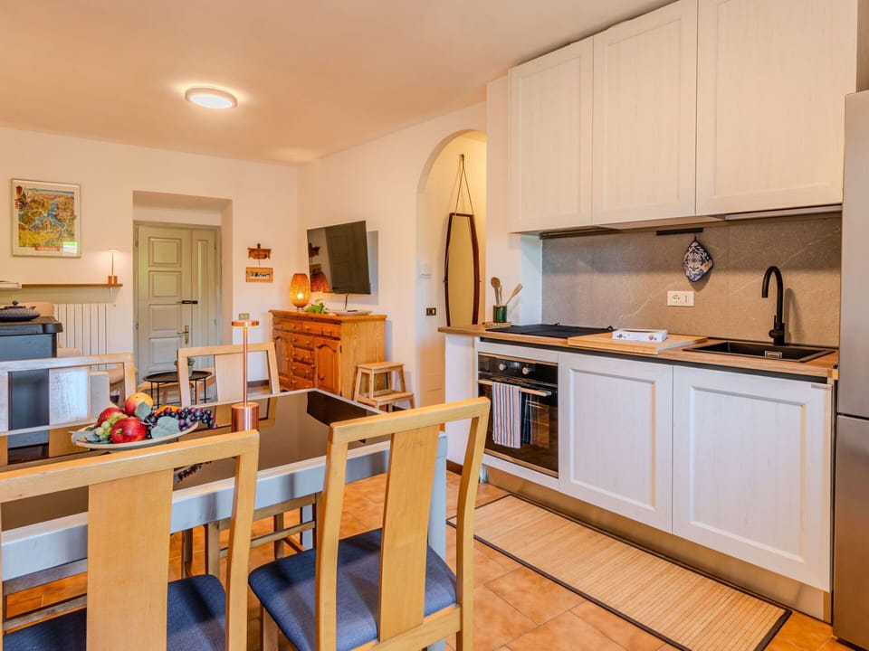 Furniture, Interior Design, Kitchen, Flooring, Countertop, Floor, Wood, Ceiling, Room, Cabinetry