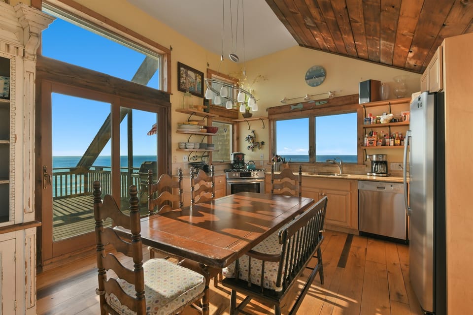 Relaxed and authentic, with a touch of nostalgia—this kitchen and dining space on the top level is meant for easy meals, open windows, and time together.
