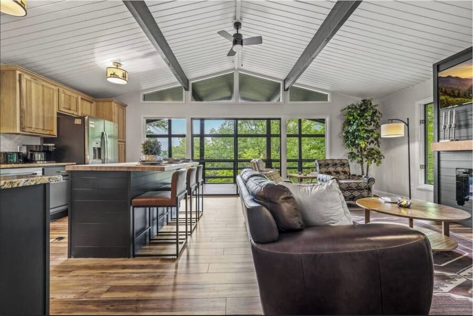 This open-concept living room and kitchen area offers space for everyone! 