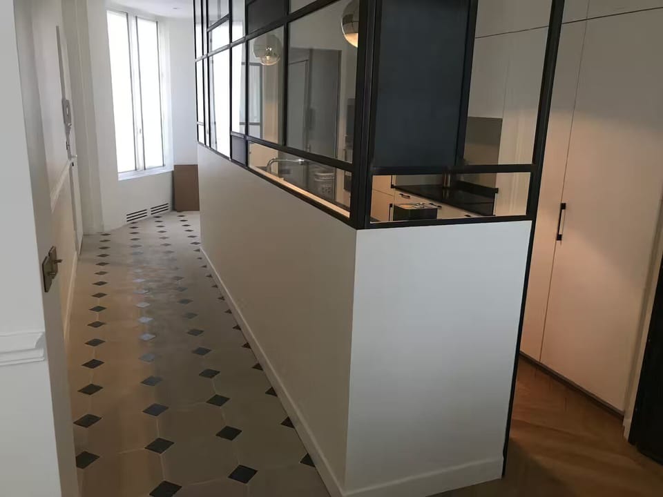 Entrance and kitchen on the right
