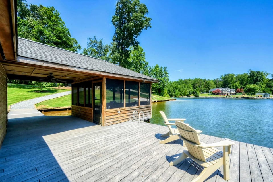 Beautiful lakefront boathouse with panoramic water views.