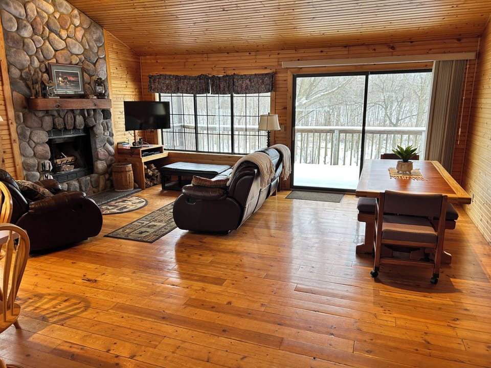 Great Room with fireplace & Dining Area