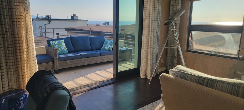 Outdoor BBQ sundeck to enjoy relaxing and viewing ocean off living room