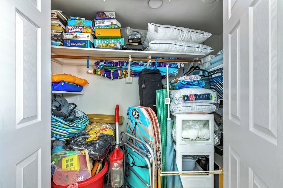 Fully stocked guest closet with all your beach-day must-haves.