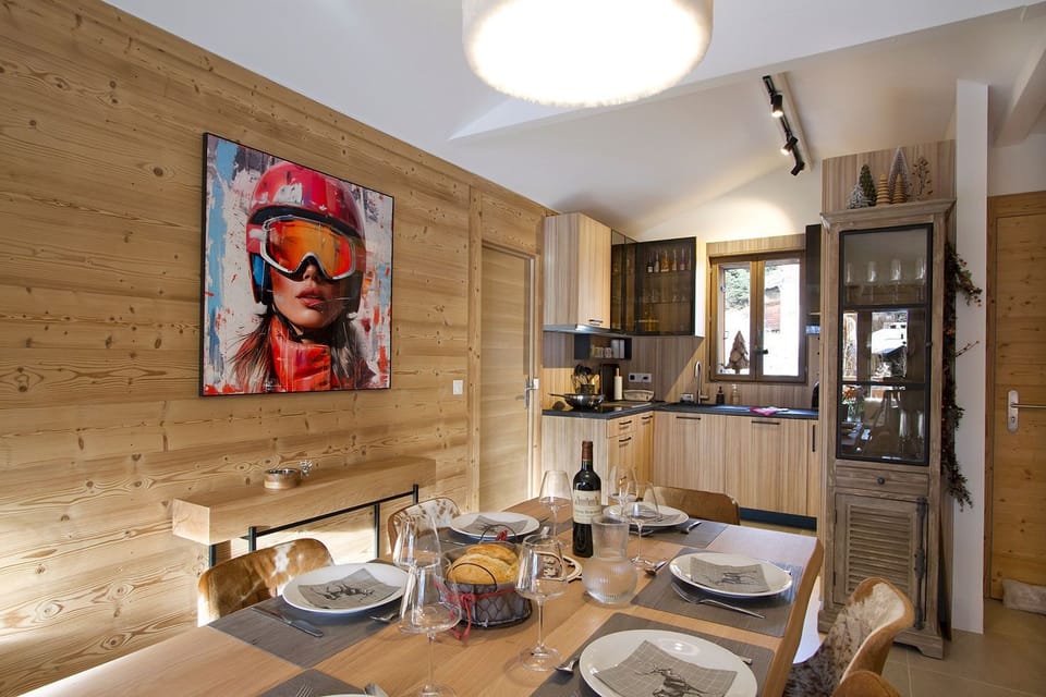 A charming dining nook, surrounded by elegant wooden finishes, creating a warm and inviting atmosphere for every meal.