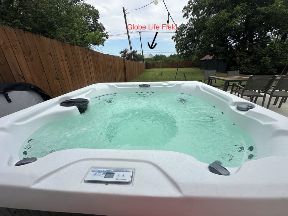 Relax in the hot tub while taking in views of Globe Life Field. 
