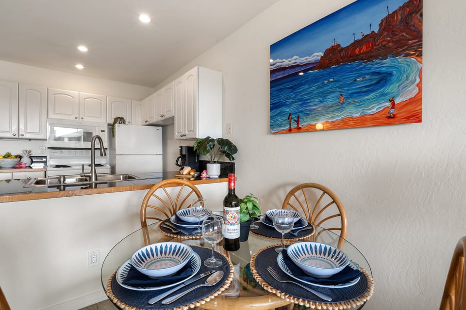 Cozy table setting with a view of the fully equipped kitchen