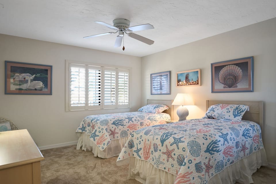 Bedroom two with two single beds.