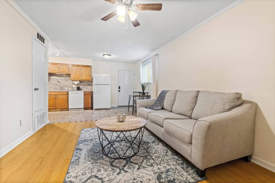 Bright living room with comfy sofa and open layout