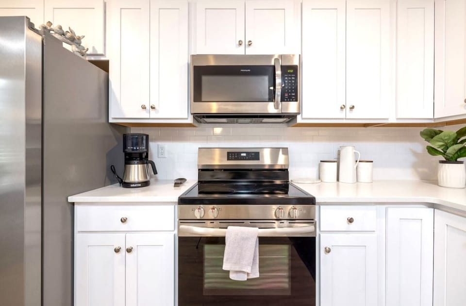 huge white fully stocked kitchen