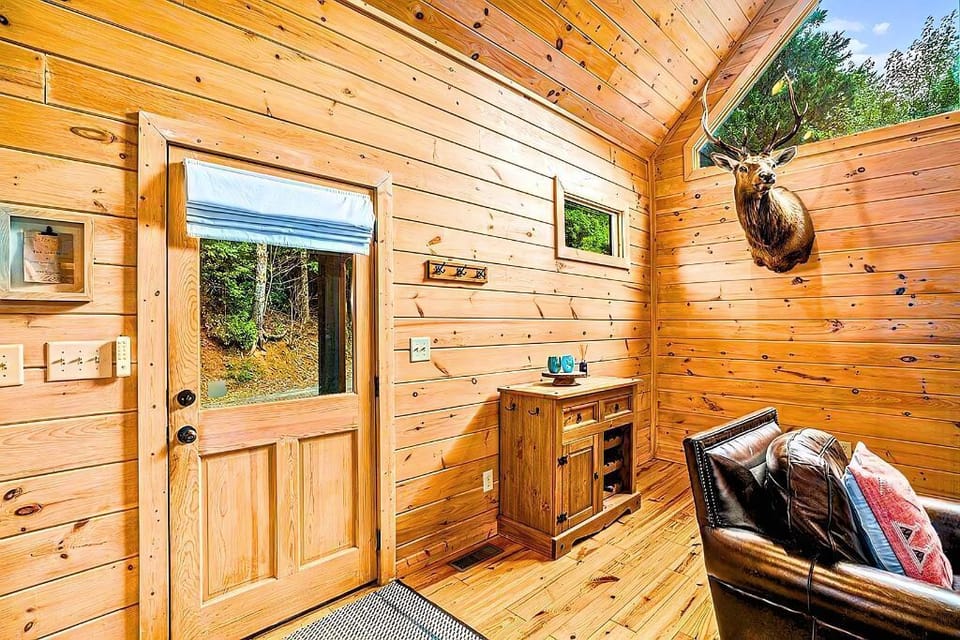 A charming little corner of the cabin with cool decor and natural light.