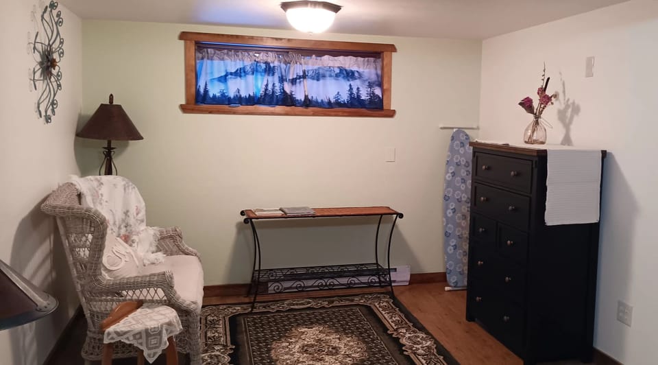 Bedroom:  The other half for reading/reflection, chest of drawers