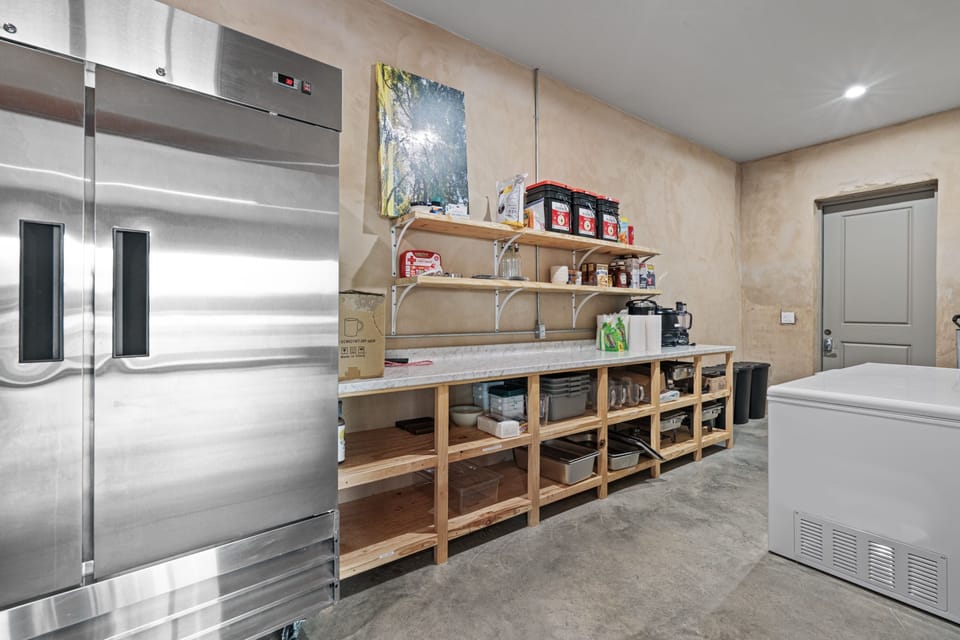 Retreat Center – Huge pantry with 54" commercial fridge & chest freezer.