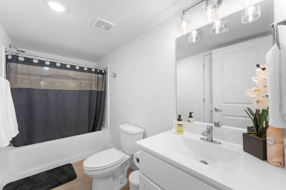 Updated bathroom with modern finishes.
