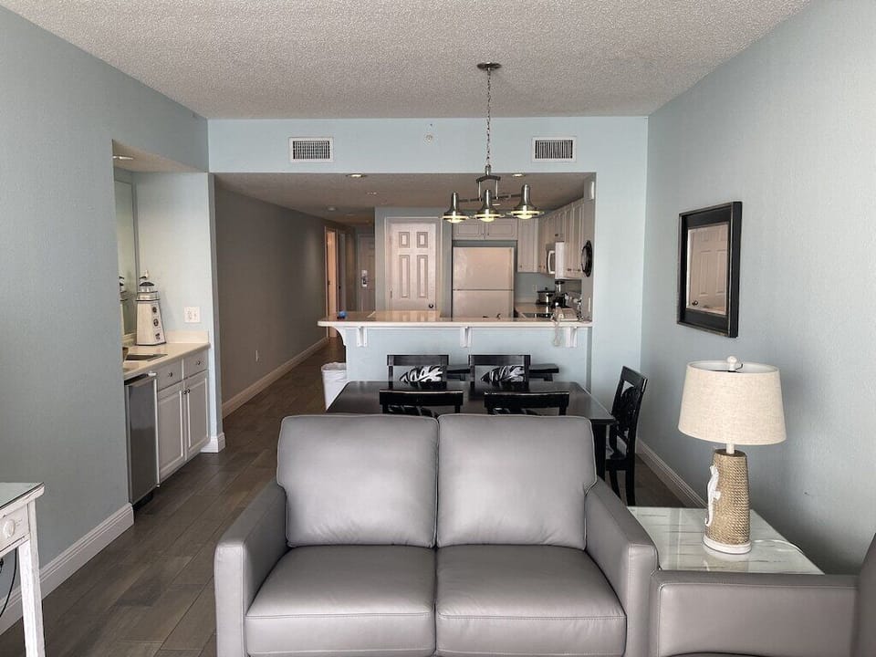 Living Room View Showing Dining Space and Ice Maker!