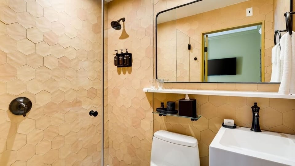 Freshen up in a sleek shower with spa-like finishes.